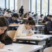 Candidati durante il test Professioni sanitarie 2026 in un’aula universitaria
